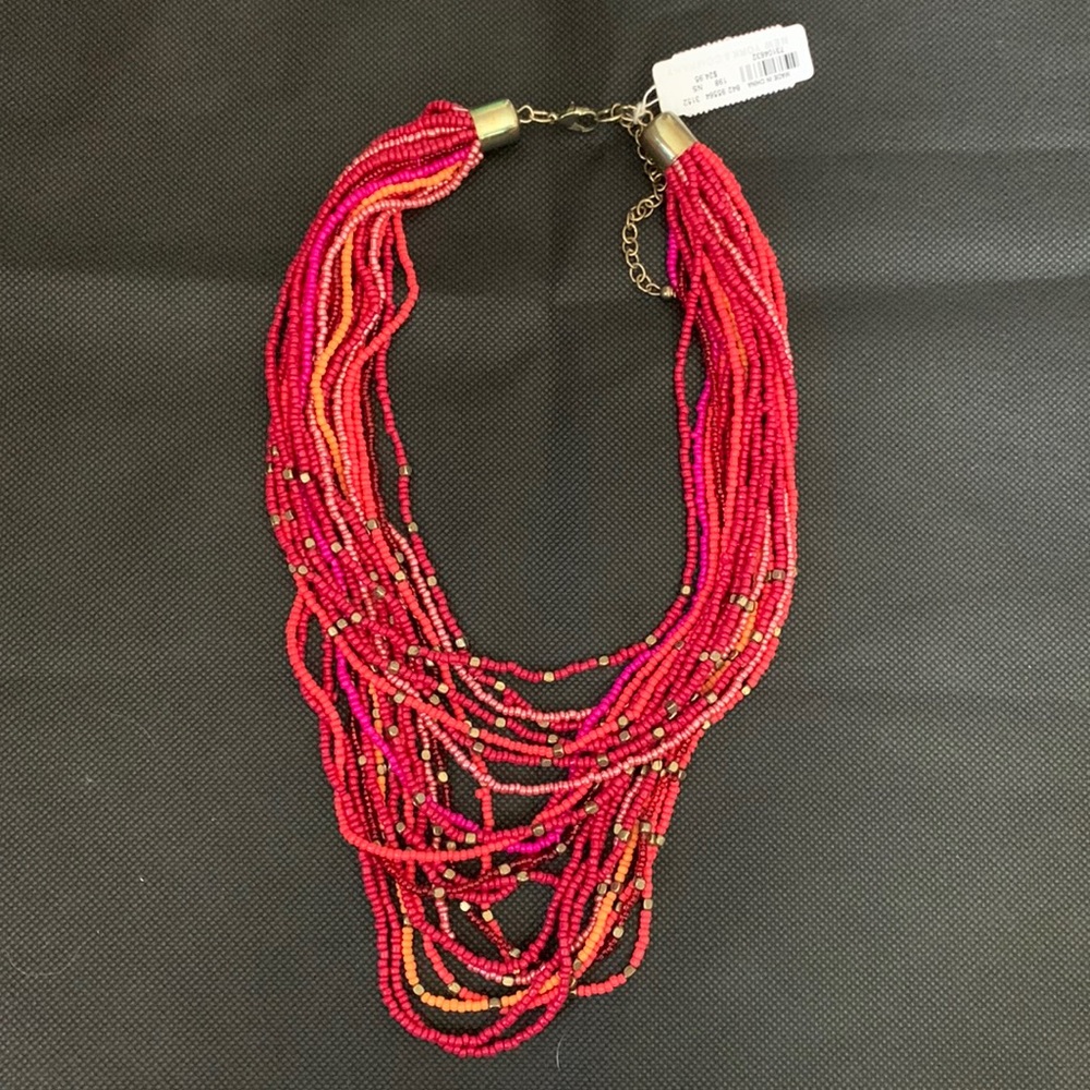 Multi row seed bead necklace with pink, red, and orange beads